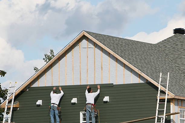 Professional Siding technician working in Sunset, FL